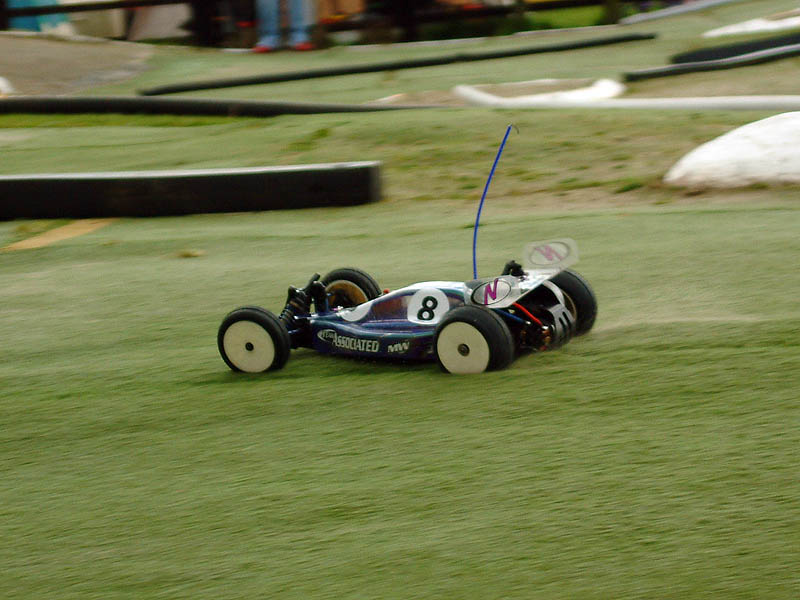 landing off the jump down the straight.