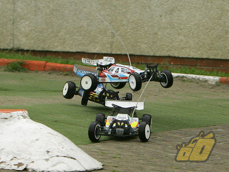 Stu Wood shows his evil side and forgets to take the corner and takes Lowe out.