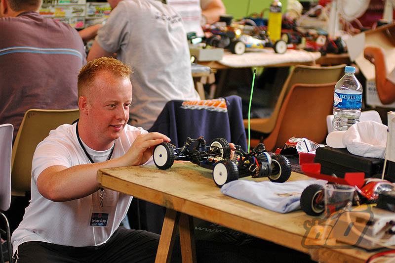 Chris Long concentrates on his car
