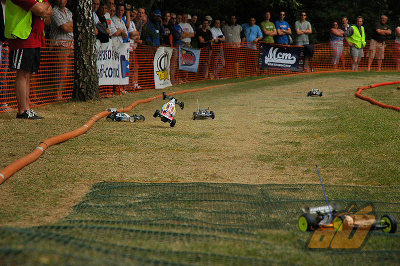 Neil slams into Bloomfield coming down the straight but keeps going