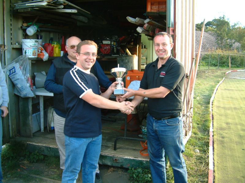 Kev Kitchen taking the winners trophy for the batley A team